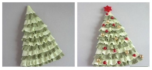 Yapılan süslemeleri asarız Noel ağacını süslemek